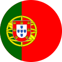Circular badge showing the Portugal flag: green on the left, red on the right, with the coat of arms in the center.